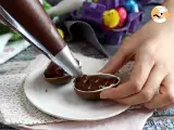 Chocolate Easter eggs stuffed with chocolate custard and topped with M&M's - Preparation step 4