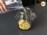 Homemade flavored water with lemon, basil and raspberry - Preparation step 4