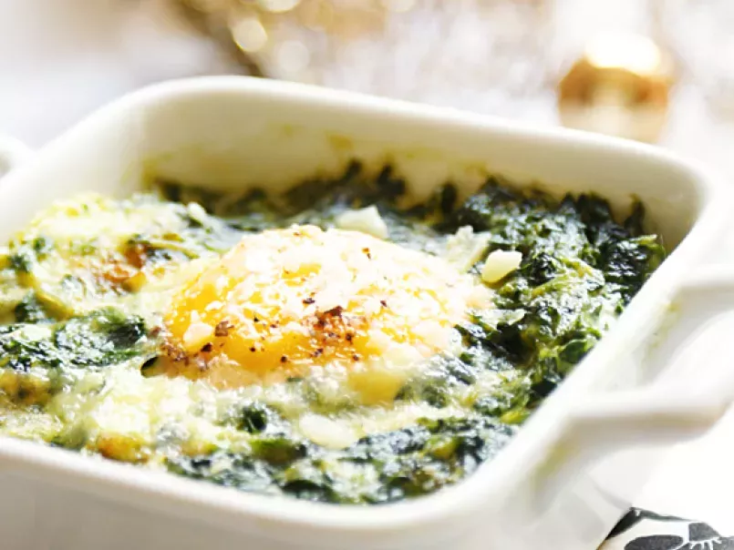 Baked eggs with spinach and Parmesan cheese