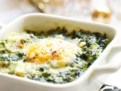 Baked eggs with spinach and Parmesan cheese