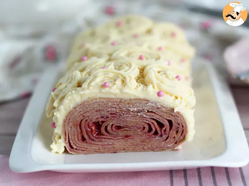 Crepe yule log with raspberry and white chocolate