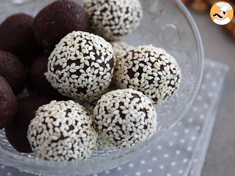 Dates and chocolate energy balls with sesame seeds - photo 3