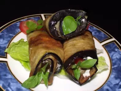 Eggplant rolls with tomato, garlic and herbs