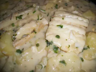 Fresh Cod Fillets with Potatoes Cooked In a Rose Wine Sauce