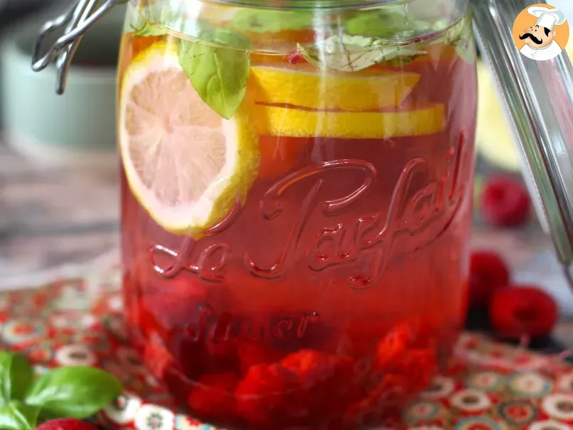 Homemade flavored water with lemon, basil and raspberry - photo 2