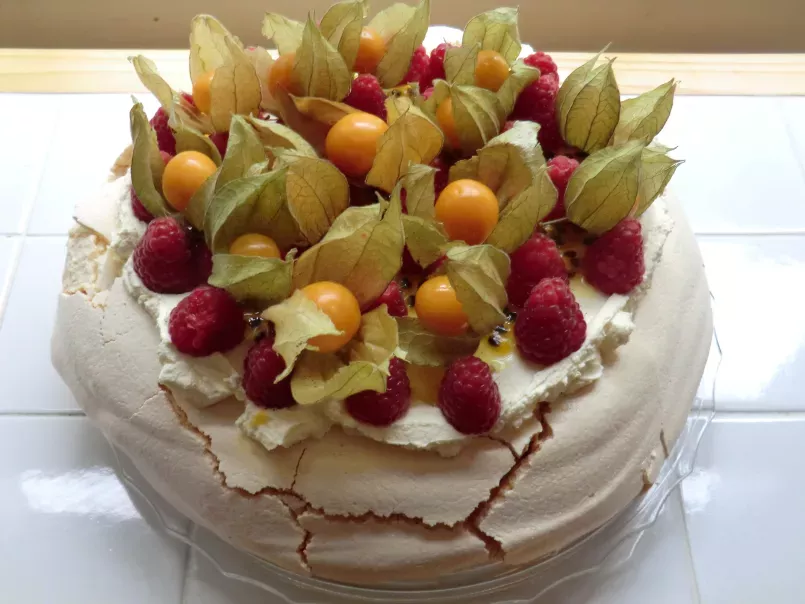 Raspberry and Physalis Pavlova with Passion Fruit Coulis