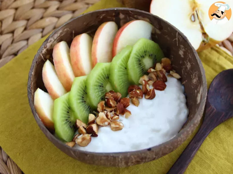 Vegan bowl with coconut milk yogurt, fruits and nuts - photo 3