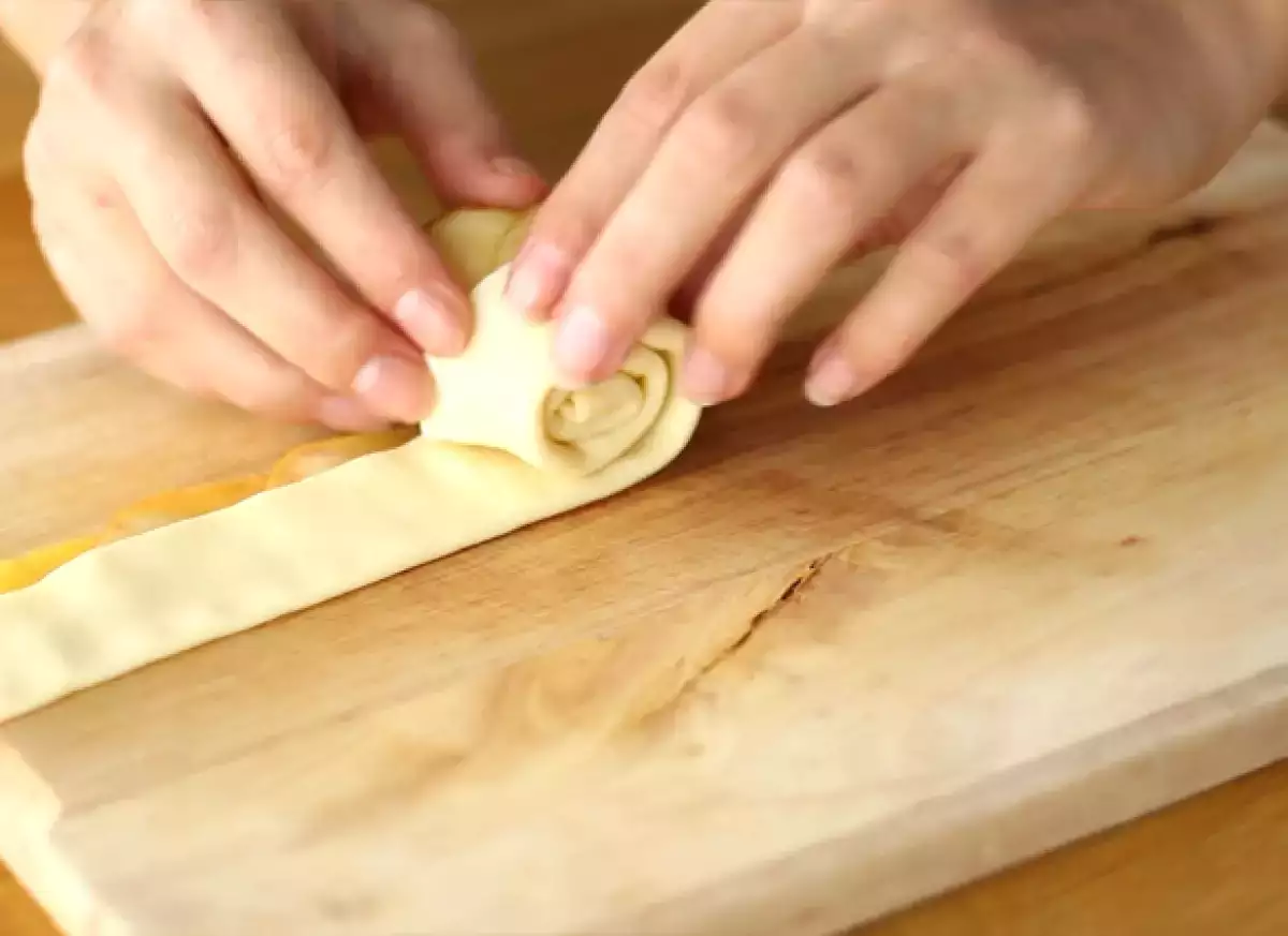 Step 4: Fold and roll to form the rose