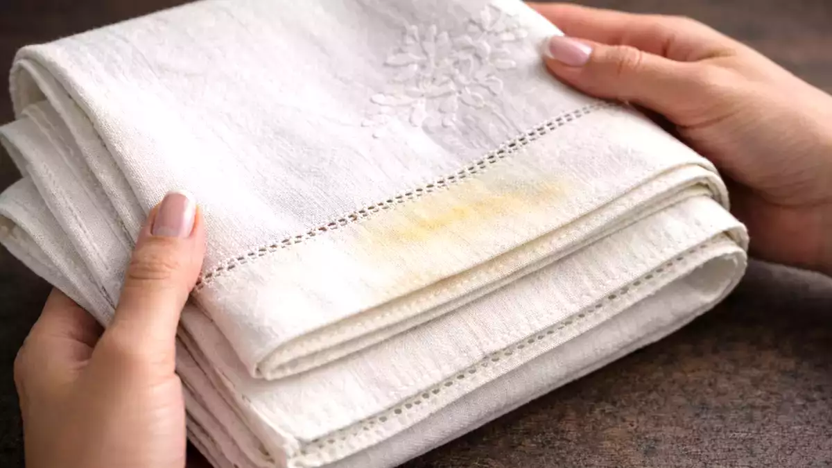 How to remove yellow stains from a tablecloth kept for special occasions