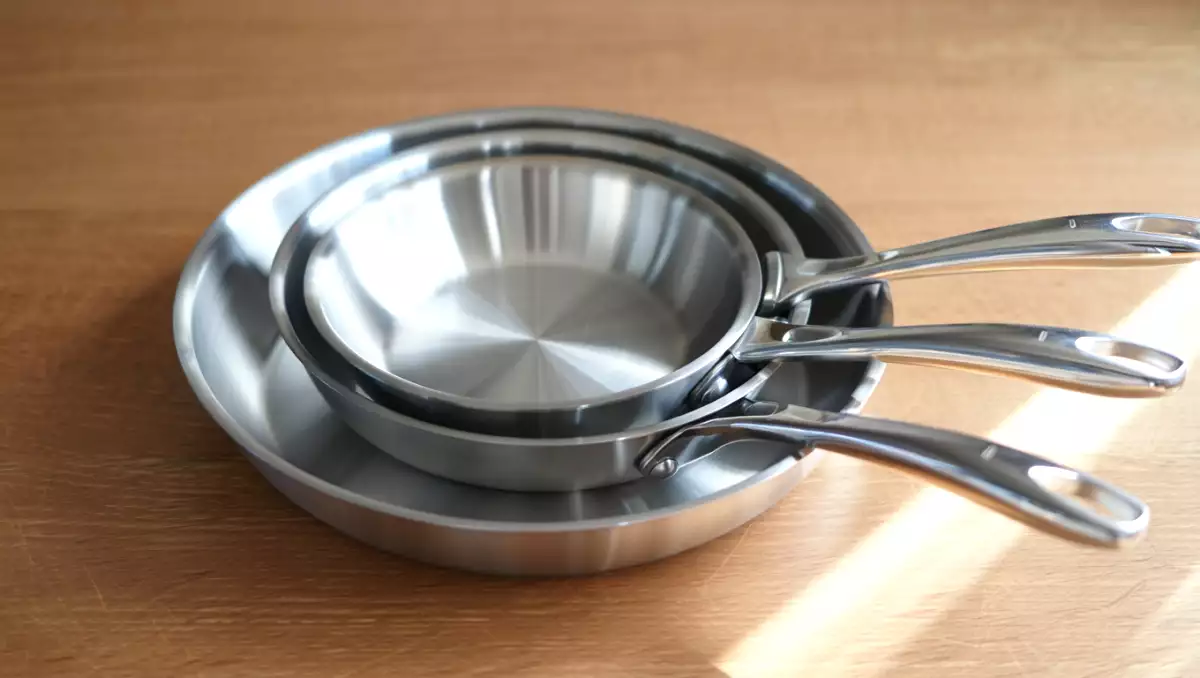 How to clean a stainless steel frying pan without damaging it?