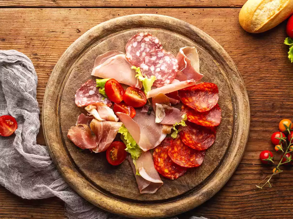 Why does the food industry add sugar to cold cuts?