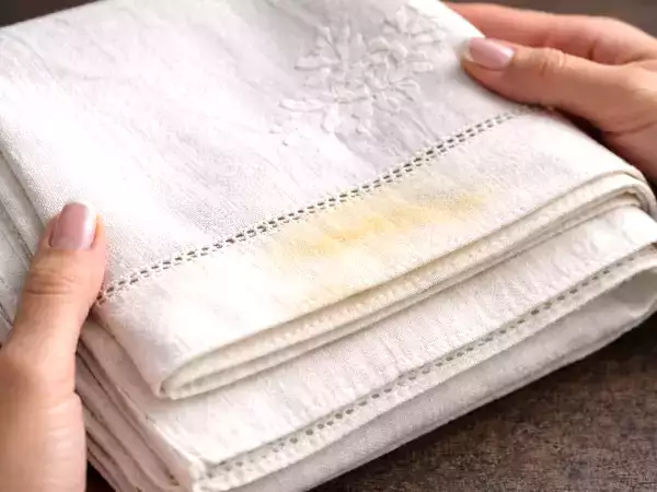 How to remove yellow stains from a tablecloth kept for special occasions