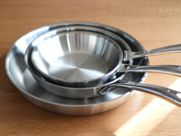How to clean a stainless steel frying pan without damaging it?