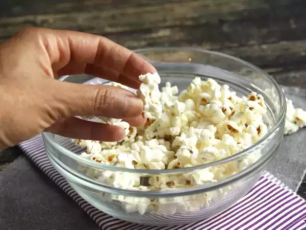 Your popcorn doesn't need more salt: it needs this to make the seasoning really stick