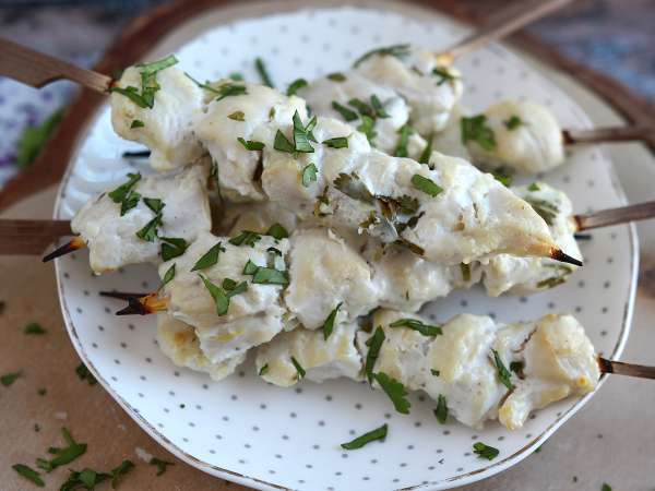 Daily Menu, april 25: Savor the flavors with a delightful trio of chicken skewers, anchovies, and fruit cake