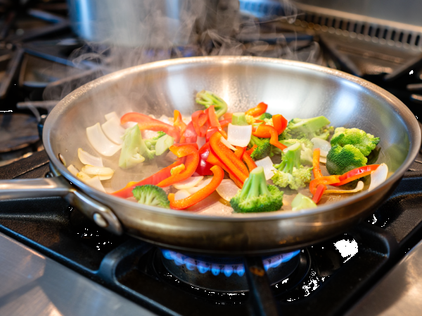 The simple kitchen trick that stops food sticking to your stainless steel frying pan every time