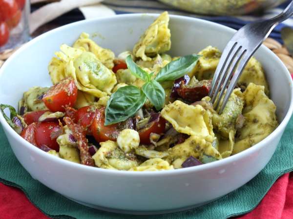 Why cold tortellini salad is ridiculed by purists, yet it still disappears before the rice salad