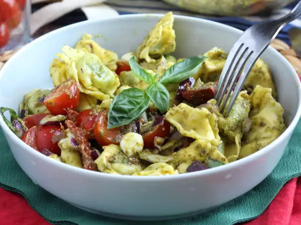Why cold tortellini salad is ridiculed by purists, yet it still disappears before the rice salad