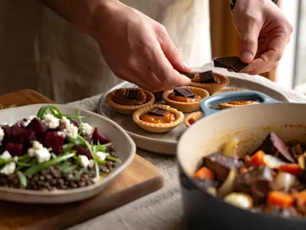 Daily menu, July 29: a delightful warm salad, hearty beef stew, and indulgent caramel chocolate tarts