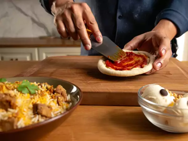 Daily menu, September 1st: delightful baby pizza, flavorful Hyderabadi mutton biryani, and creamy homemade ice cream