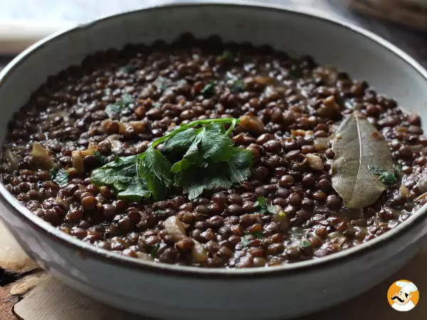 How do you cook green lentils without them staying hard or turning into a puree?