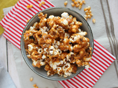 Why is popcorn the perfect accompaniment to movies?