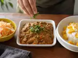 Articles: Daily Menu, September 24: a delightful blend of American-style coleslaw, methi baingan bharta, and sticky rice with mango