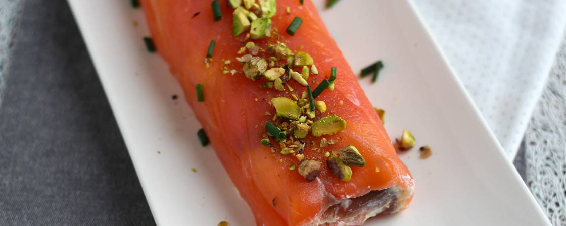 Salmon roll with ricotta cheese and pistachios, the perfect appetizer for christmas parties