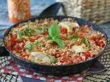 Recipe One-pot chicken dish with rice, tomatoes, and bell peppers