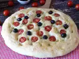 Recipe Thick, fluffy focaccia with cherry tomatoes, olives, and oregano