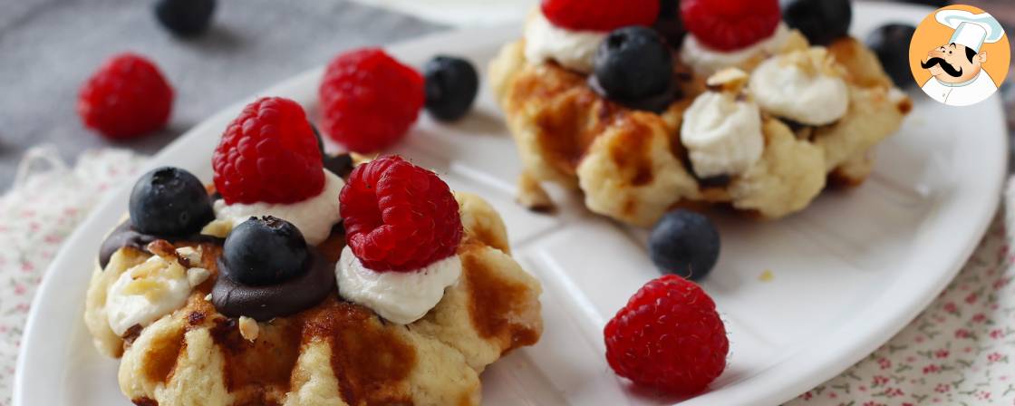 Fruit, chocolate and whipped cream waffles