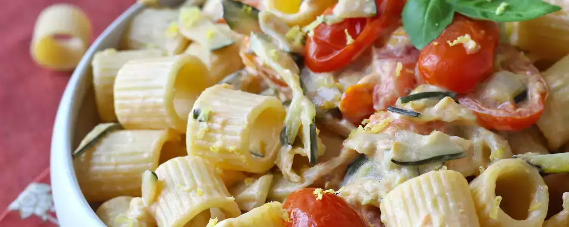 Creamy zucchini and cherry tomato pasta with lemon