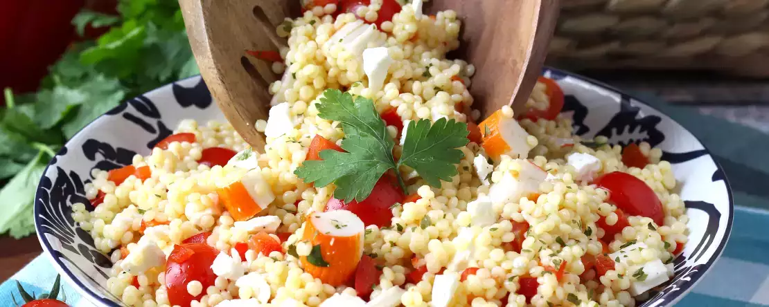 Pearl couscous salad with surimi: fresh, easy, and perfect for summer