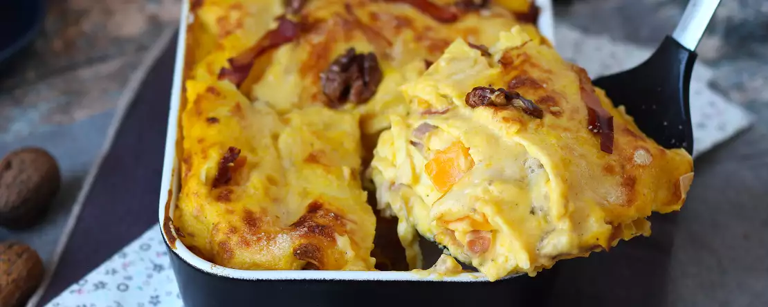 Lasagna with pumpkin, speck, and creamy, crunchy walnuts