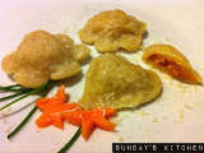 Buckwheat ravioli stuffed with pumpkin and mashed potatoes