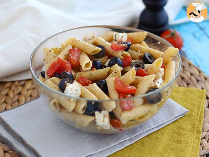 Pasta salad, with tomato, feta cheese and olives