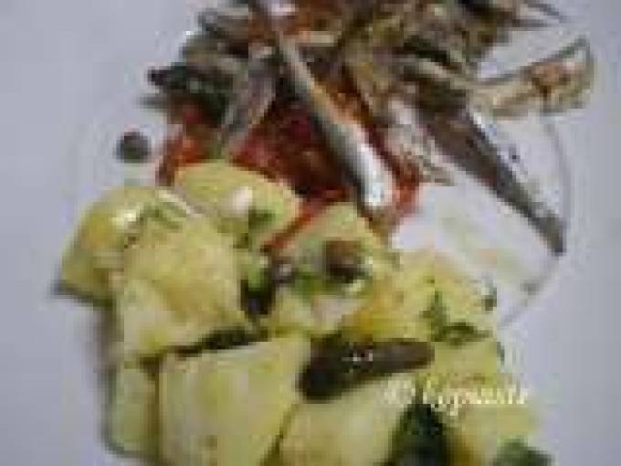 Gavros Ladorigani and Potato Salad