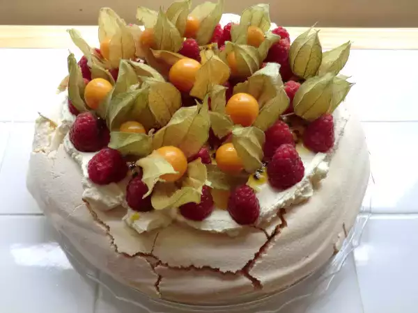 Recipe Raspberry and physalis pavlova with passion fruit coulis