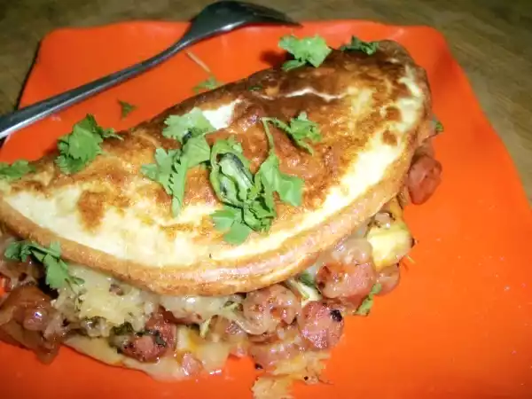 Recipe Fluffy egg omlette with chicken sausage filling