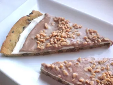Recipe Chocolate chip cookie pizza topped with toffee.