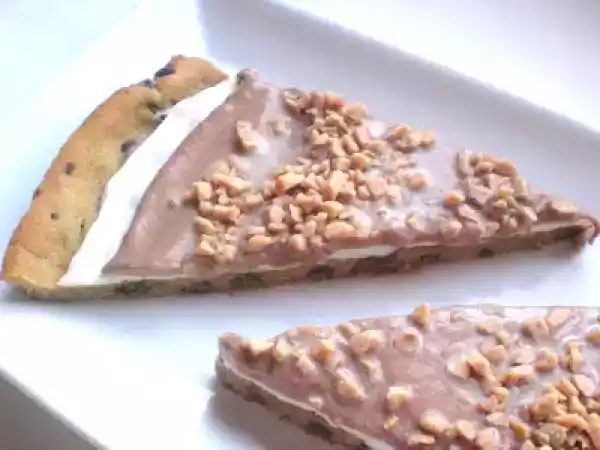 Recipe Chocolate chip cookie pizza topped with toffee.