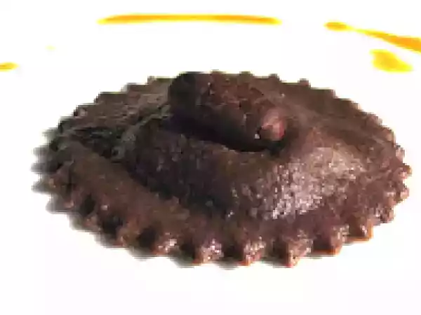 Recipe Chocolate ravioli with white truffle ganache & blood orange sauce