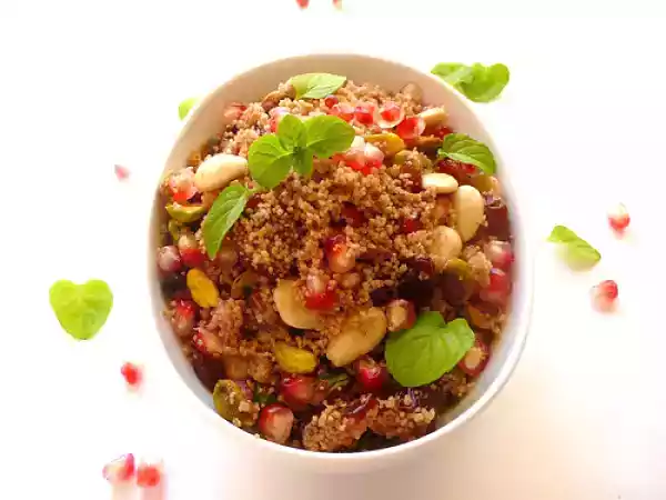 Recipe Spiced cous cous with dried fruits, pomegranate and mint