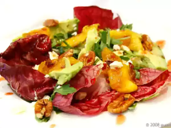 Recipe Grilled mango and pecan salad with fetta, avocado and sweet chilli-raspberry dressing