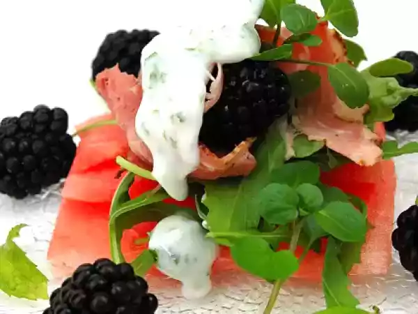 Recipe Watermelon carpaccio with pastrami, black berries and a light yogurt and mint dressing