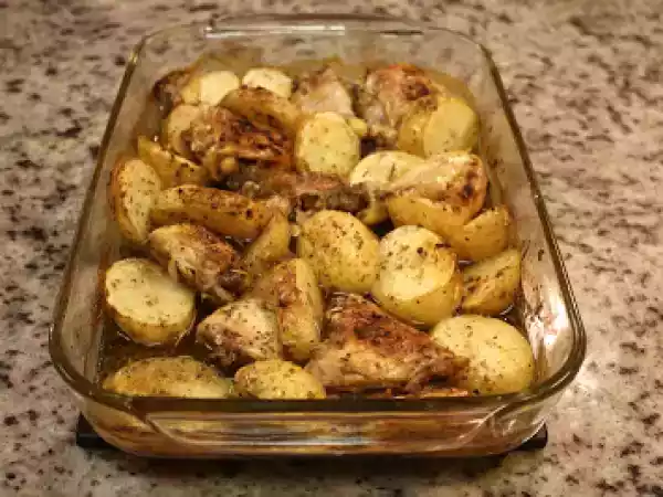 Recipe Chicken pieces and potato wedges, roasted greek style
