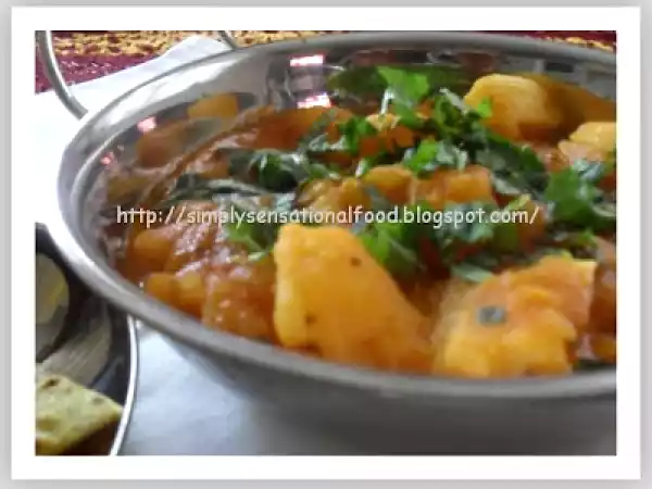 Recipe Masala mogo ( yucca) in gravy.