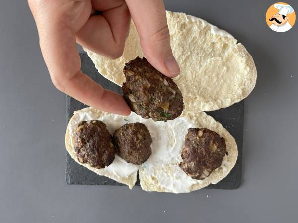 Turkish köfte meatball sandwiches in kebab bread - Preparation step 1