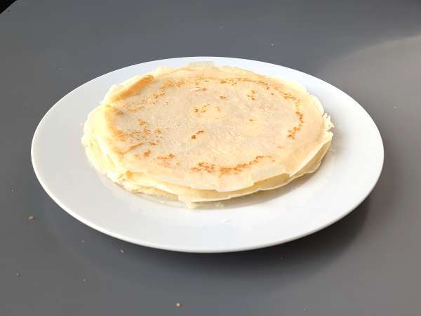 Ricotta and mushroom crepes: the perfect creamy vegetarian recipe for any occasion - Preparation step 6