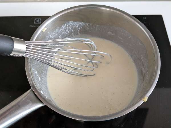 Ricotta and mushroom crepes: the perfect creamy vegetarian recipe for any occasion - Preparation step 7